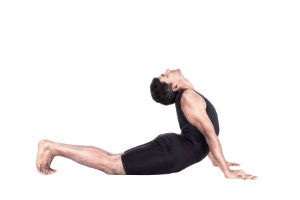 Man in a sun salutation pose